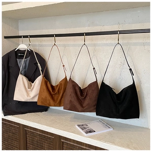 Hobo bags in four colors: cream, mustard, coffee, and black with adjustable straps