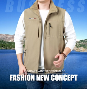 Detail of khaki fleece vest with stand collar, zip pockets and warm lining for men
