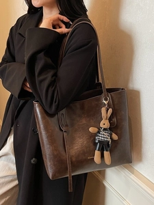 Retro coffee brown large capacity leather tote bag with a small rabbit charm accessory