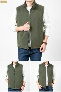 Detail view of military green fleece vest with stand collar and zipper pocket details