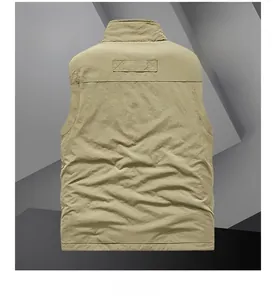 Detail view of khaki reversible vest with fleece lining and windproof fabric back side