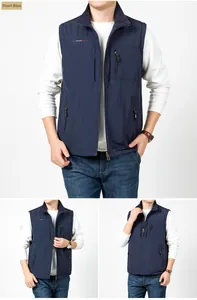 Detail of navy blue fleece vest featuring a stand collar and zippered chest pocket