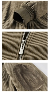 Detail view of brown corduroy jacket with ribbed cuffs, metal zipper, and suede elbow patches