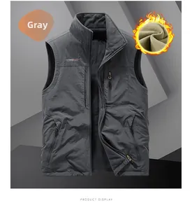 Detail view of deep gray vest showing windproof shell and thick polar fleece lining