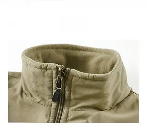 Detail view of the stand-up collar with metallic zipper and warm fleece lining
