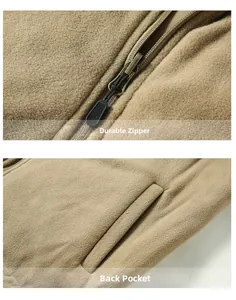 Detail of durable zipper and reversible fleece inner pocket on a men's winter vest