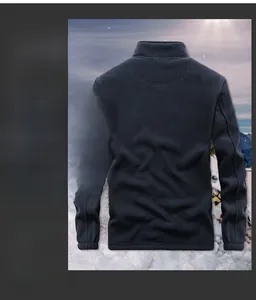 Detailed view of thermal fleece fabric on high collar outdoor jacket in snow background
