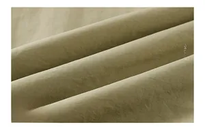 Detailed macro shot of olive green modal cotton spandex fabric texture for outdoor vests