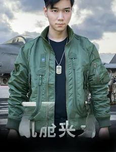 Detail of army green bomber jacket with windproof nylon fabric and tactical utility pockets