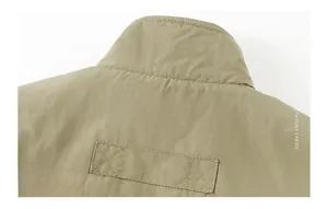 Detailed view of reinforced stitching on khaki cotton spandex fabric jacket collar