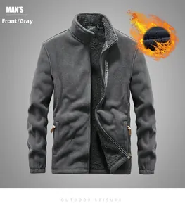 Detail of dark gray fleece jacket showing thermal black lamb wool lining and zipper