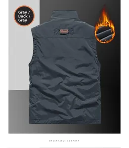 Detail view of the gray reversible fleece vest back with classic leather tag and stand collar