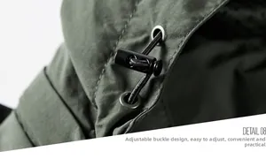 Macro detail of adjustable elastic drawstring and metal eyelet on army green jacket