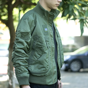 Tactical MA-1 pilot bomber jacket in olive green featuring military embroidered patches