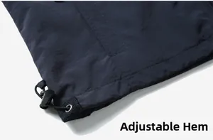 Détail de l'ourlet ajustable avec cordon de serrage sur veste de travail bleu marine