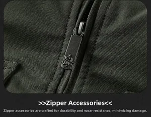 Detailed close-up of premium metal zipper with embossed crest on military green jacket