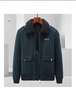Detail of deep blue bomber jacket featuring a warm gray fleece collar and thick inner lining