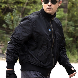 Men's black tactical flight bomber jacket with military patches and windproof fabric design