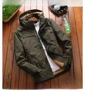 Detail view of winter outdoor jacket with warm fleece lining and olive green fabric