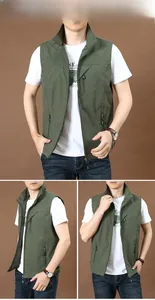 Detail view of military green outdoor vest featuring stand collar and zipper pockets