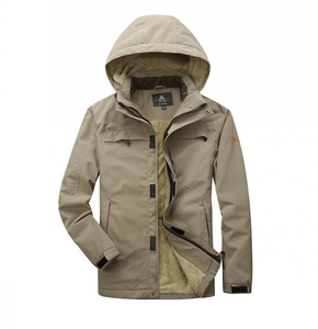 Detail of khaki outdoor jacket showing windproof fabric and warm fleece lining texture
