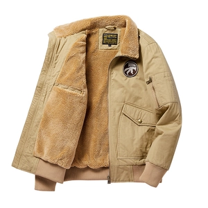 Men's khaki sherpa-lined flight jacket with military patch and ribbed cuffs on white back