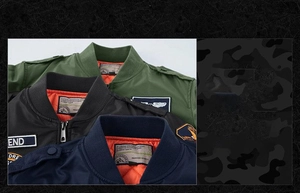 Detail of bomber jackets featuring windproof nylon fabric and orange quilted lining