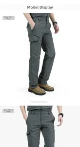 Vue détaillée du pantalon cargo gris à séchage rapide avec grandes poches et cordon de serrage