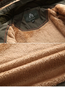Detail of warm brown fleece lining and label on a men's waterproof hiking jacket