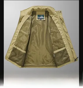 Detail view of khaki outdoor vest showing breathable mesh lining and inner pocket