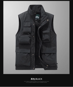Detail of black utility vest showing multi-pocket design and breathable mesh lining