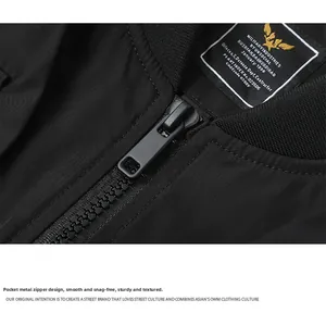 Detail of military style jacket with a robust metal zipper and woven fabric texture