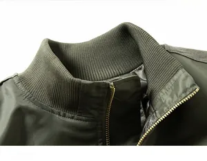 Close-up of army green bomber jacket ribbed collar and premium metal zipper detail