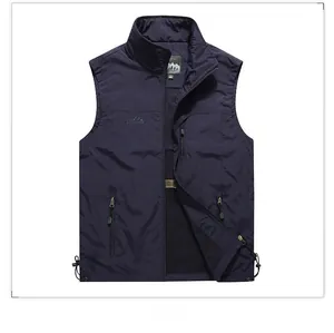 Detailed view of navy blue outdoor vest featuring full zipper and three zip pockets