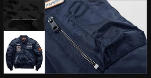 Detail view of military-style embroidered patches and sleeve zipper pocket on bomber jacket