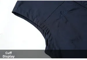 Detail showing the curved armhole and reinforced stitching on this navy outdoor vest
