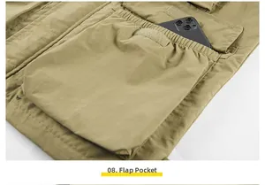 Detail of outdoor multi-pocket khaki vest showing large flap pocket with velcro closure