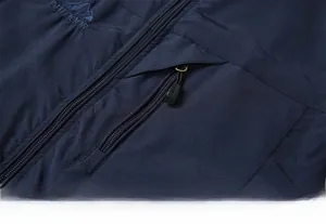 Macro detail of navy blue outdoor vest featuring a zipper chest pocket and logo embroidery