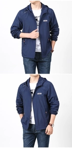Detail view of navy blue hooded sun protection jacket with outdoor logo and zip pockets