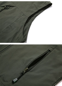 Detail of army green quick-dry vest showing zipper pocket and SPORTS puller