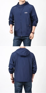 Detail view of navy blue hooded sun protection jacket with outdoor adventure chest print