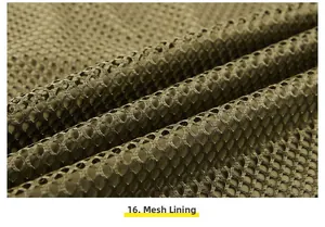 Detailed macro view of the breathable olive mesh lining on this outdoor fishing vest