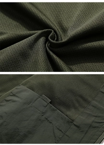 Detail of army green breathable mesh fabric and reinforced double stitching on outdoor vest
