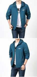 Detail of dark teal hooded sun protection jacket with zipper and windproof high collar