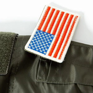 Tactical US flag embroidery patch on military MA-1 jacket with velcro backing detail