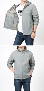 Detail of grey quick-dry hooded sun protection jacket with outdoor adventure logo