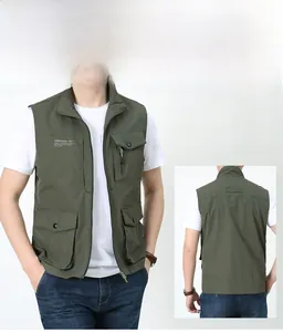 Detail view of army green utility vest featuring multiple pockets and high neck collar