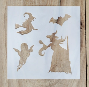 Makro-Detail von Halloween Schablone aus PET mit Hexe Geist und Fledermaus Ausschnitten