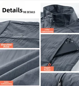Detail der dunkelgrauen Sonnenschutzjacke mit Reißverschlusstaschen und atmungsaktivem Stoff