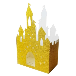 Close-up of golden glitter castle candy box with hollow star and door details